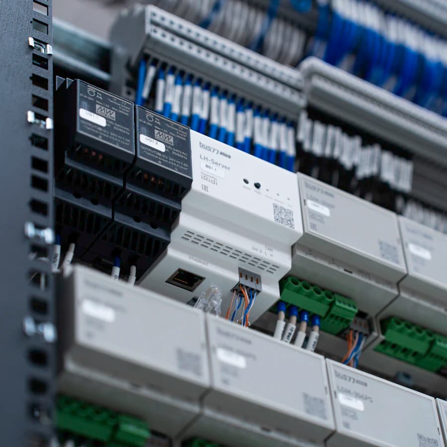 Neatly wired DIN-rail mounted control modules inside a panel
